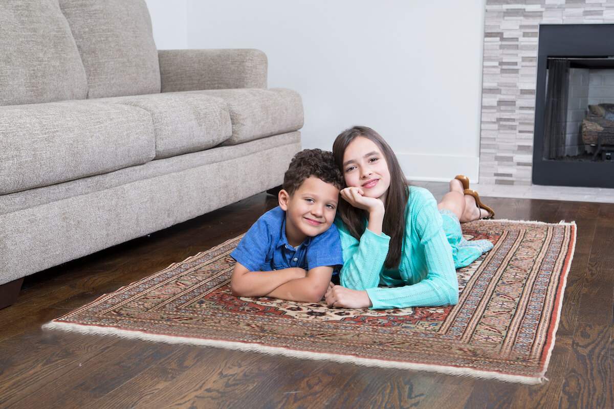 children-on-area-rug children laying on area rug