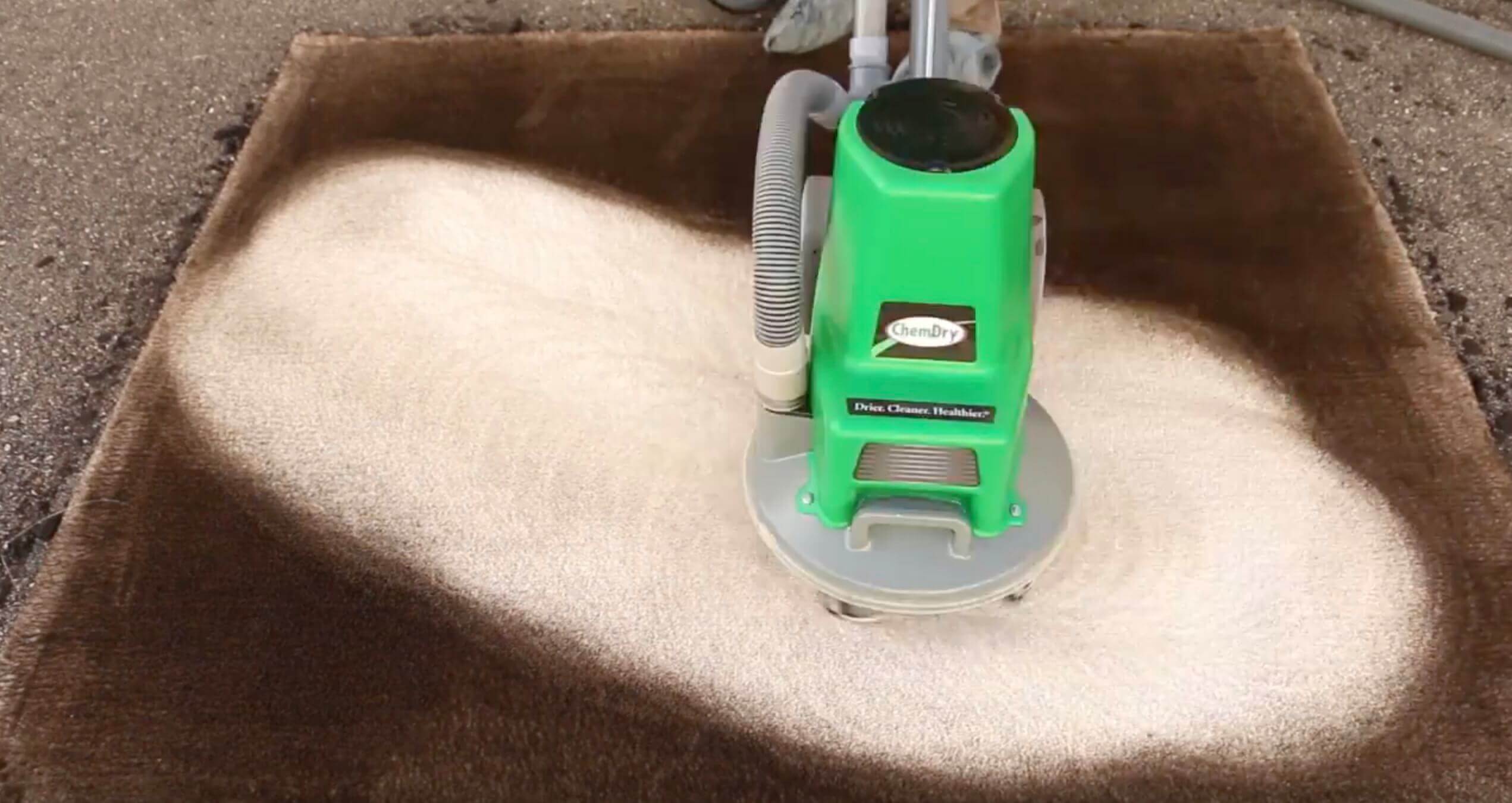 chemdry-carpet-cleaning-service-1-1 a chem dry powerhead in the process of cleaning a carpet